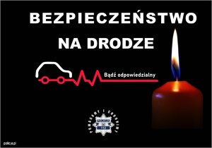 napis bezpieczeństwo na drodze i zapalona świeczka